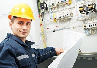 Electrician checking cabling power line - Electrical Contractor in Dewitt, MI