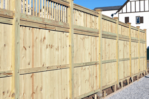 White Curve House Fence — Privacy in Caledonia,WI White Curve House Fence — Privacy in Caledonia,WI
