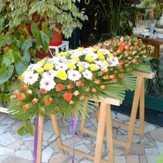 cuscino funebre di gerbere e rose