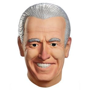 A close up of a man 's face with a smile on it