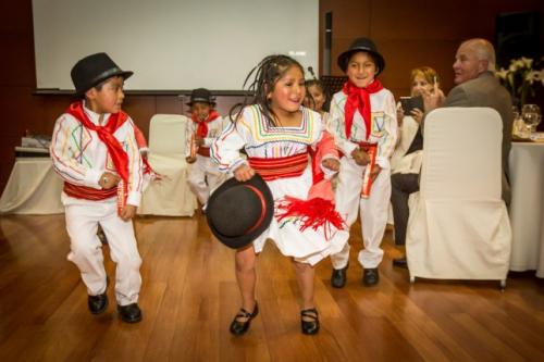 Children from Foundation Arco Iris performed a traditional Bolivian dance for the guests.