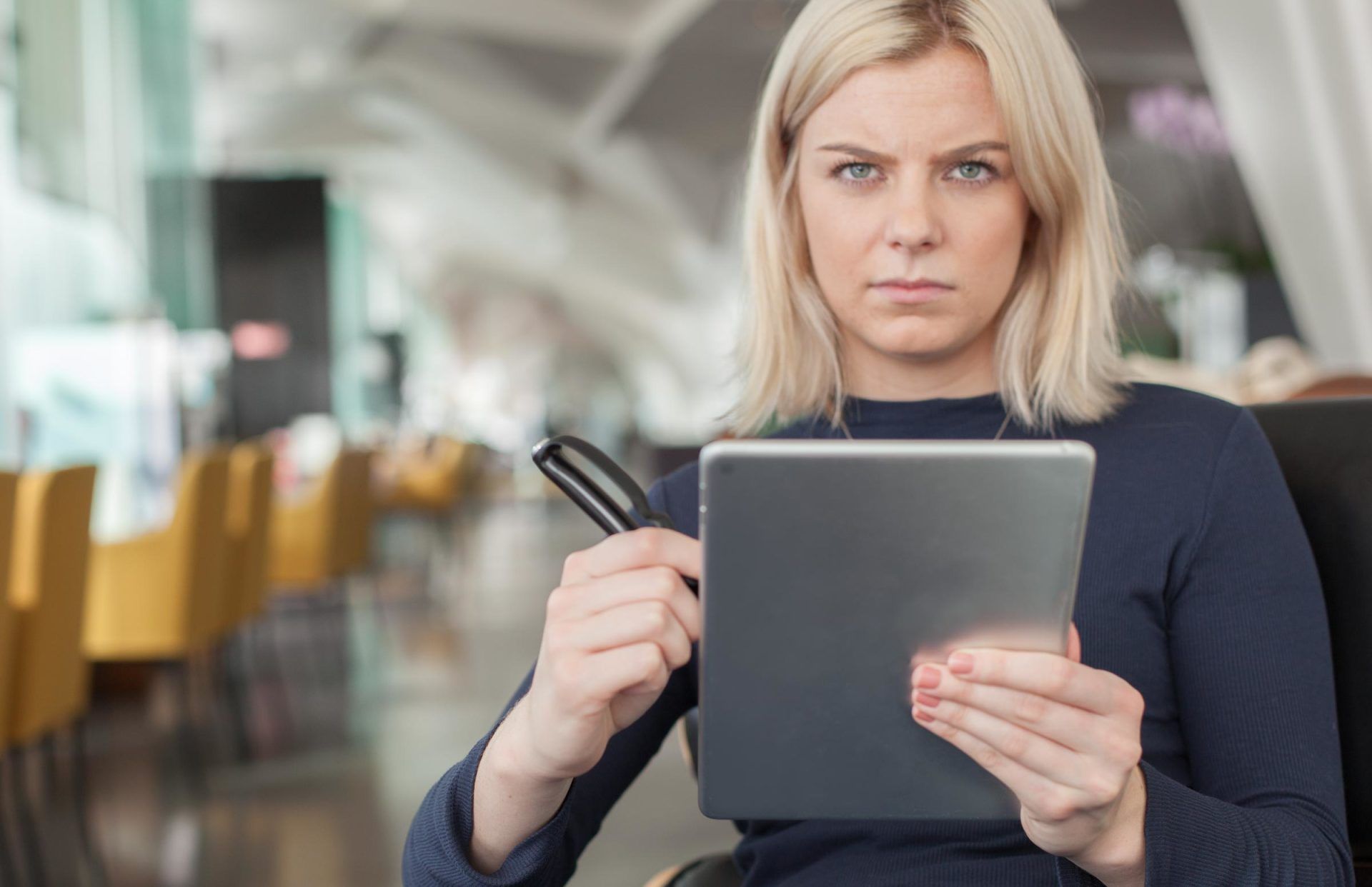 An artist using Scriba stylus in a modern setting