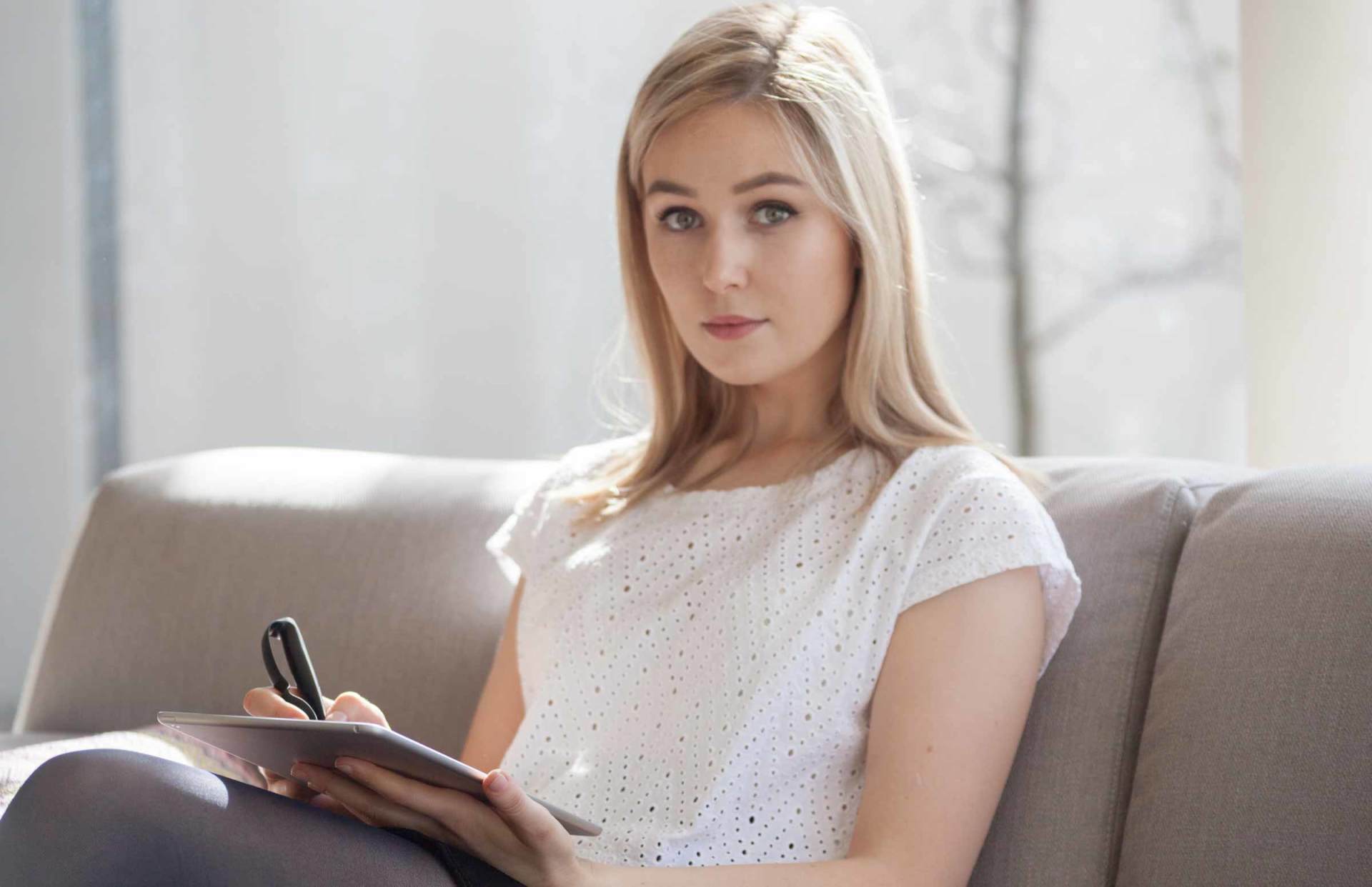 An artist using Scriba stylus in a modern setting
