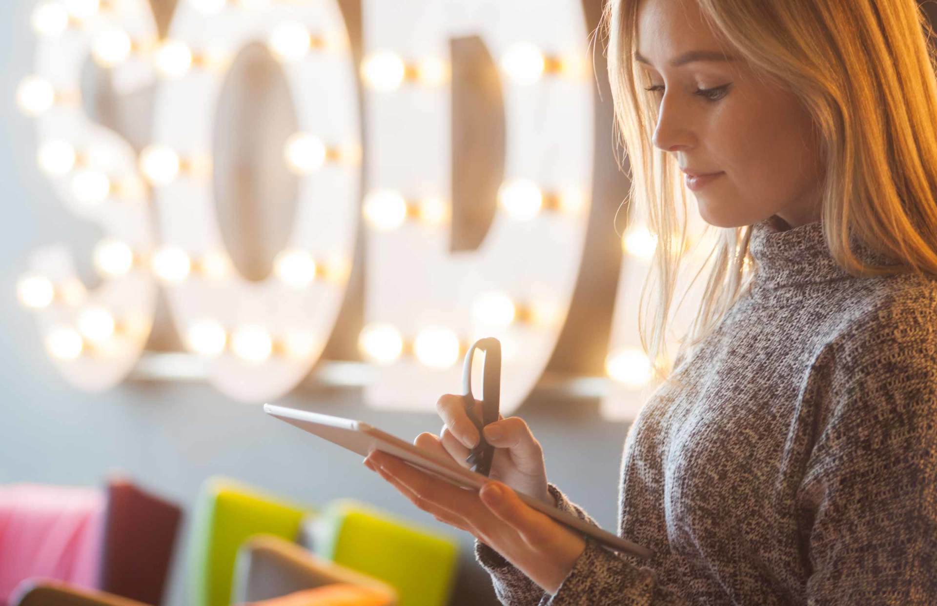 An artist using Scriba stylus in a modern setting