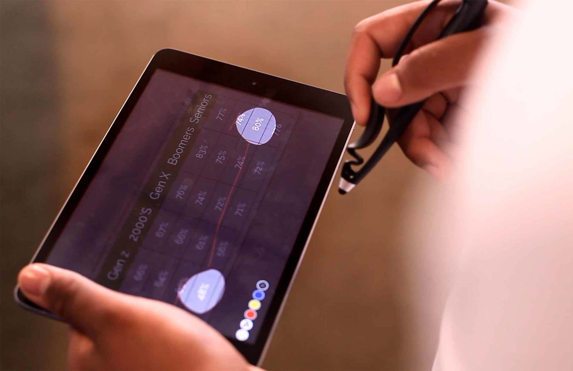 An artist using Scriba stylus in a modern setting