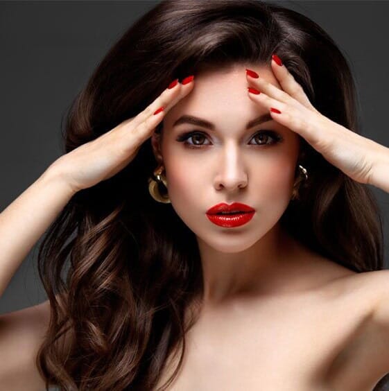Woman with red nails — Beauty Salons in Murrysville, PA Woman with red nails — Beauty Salons in Murrysville, PA