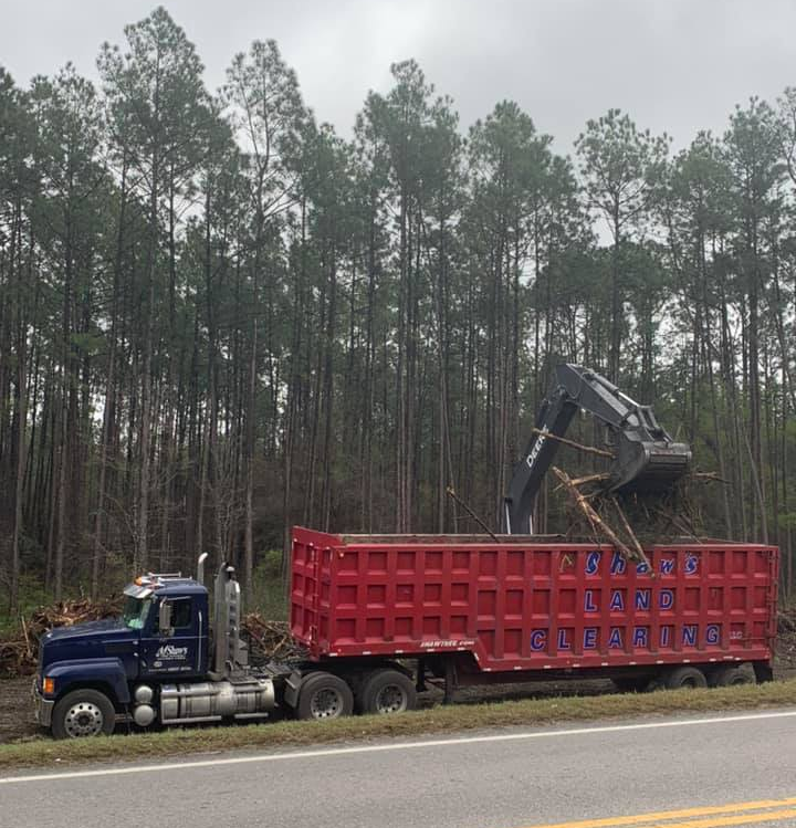 Junks On Truck Container — Jacksonville, FL — Shaw’s Land Clearing, LLC Junks On Truck Container — Jacksonville, FL — Shaw’s Land Clearing, LLC