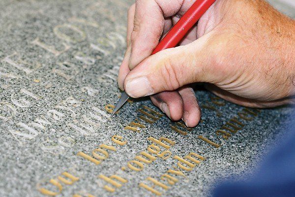 man doing stonework