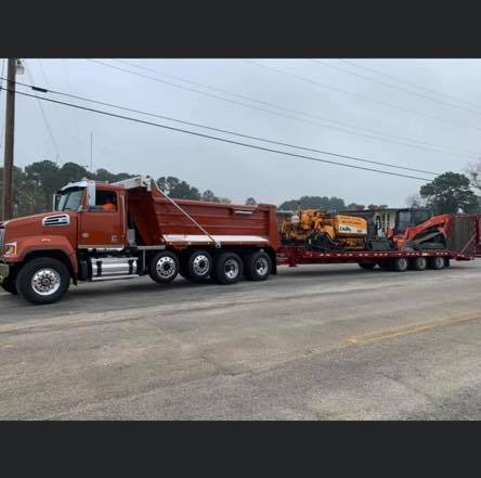 Paving Truck — Gaston, SC — Huggins Paving & Sealcoating - ABC Sealcoating & Striping Paving Truck — Gaston, SC — Huggins Paving & Sealcoating - ABC Sealcoating & Striping