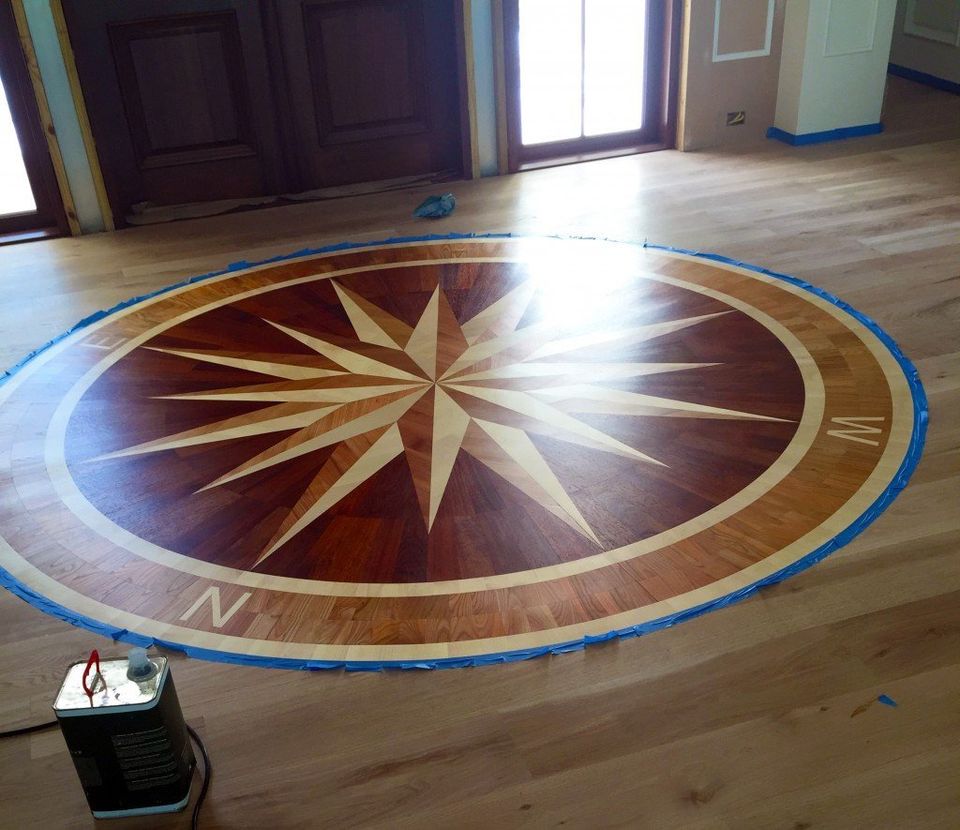 Compass — Compass Inlay Was Installed And Finished By The Wood Floor Company in Naples, FL Compass — Compass Inlay Was Installed And Finished By The Wood Floor Company in Naples, FL