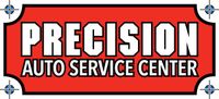 A red sign that says precision auto service center