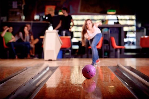 woman rolling the ball
