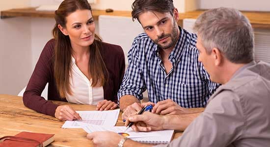 Couple Having A Negotiation — Insurance in San Antonio, TX Couple Having A Negotiation — Insurance in San Antonio, TX