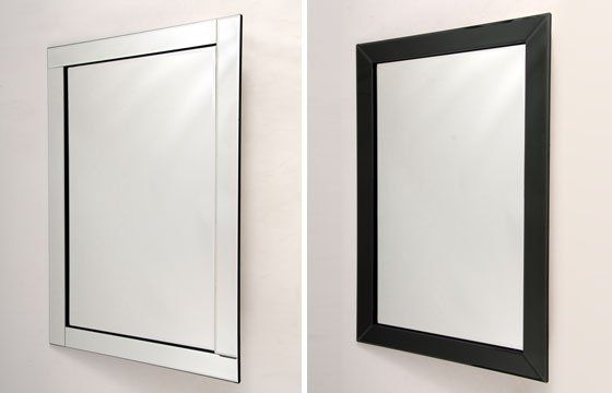 Mirrors above fireplace