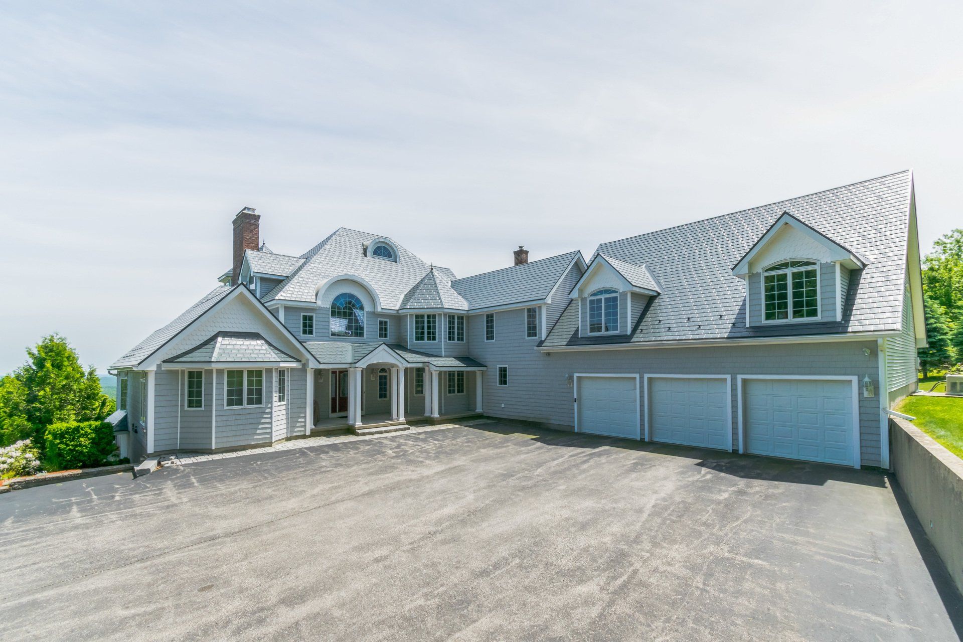 Princeton, MA — Deep Charcoal Interlock® Metal Slate Roof with Solar Panels