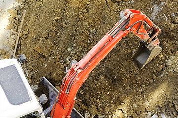 Excavator working in construction land