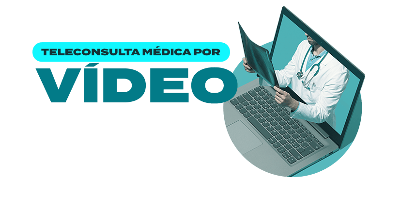Um médico está sentado em frente a um laptop.