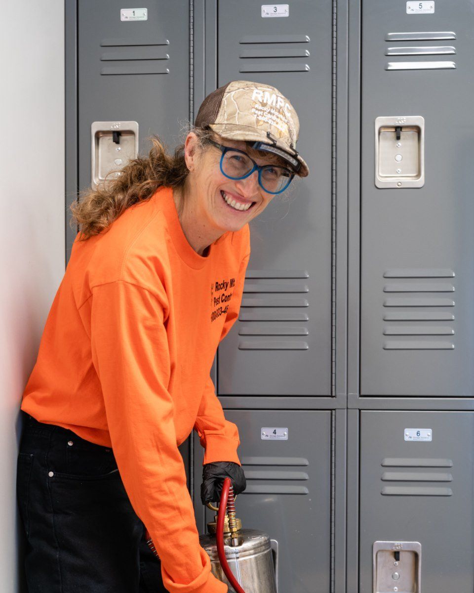 Woman Worker Smiling — Santa Fe, NM — Rocky Mountain Pest Control