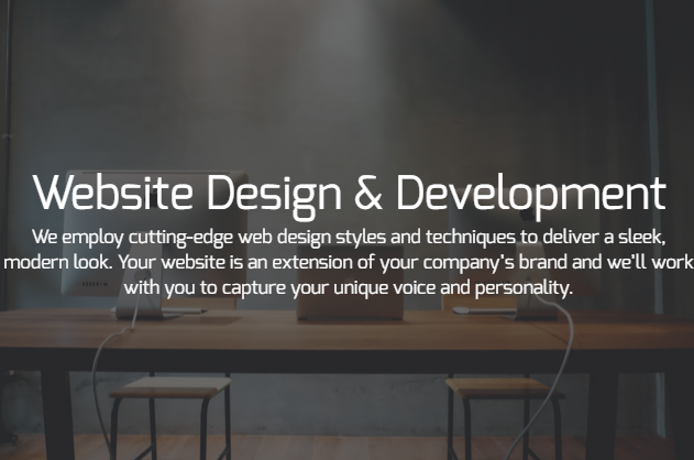 A website for website design and development with a table and chairs