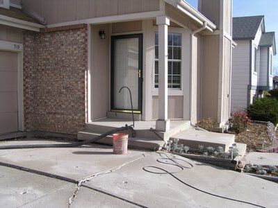 Before drive way renovation — Concrete patios in Brighton, CO