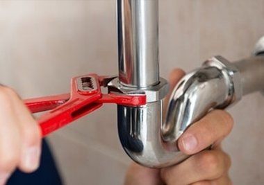 Plumber Fixing Sink Pipe — Plumbers in Forster, NSW Plumber Fixing Sink Pipe — Plumbers in Forster, NSW