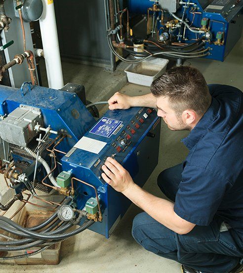 Home Inspection — Man Inspecting The Generator in Raleigh, NC