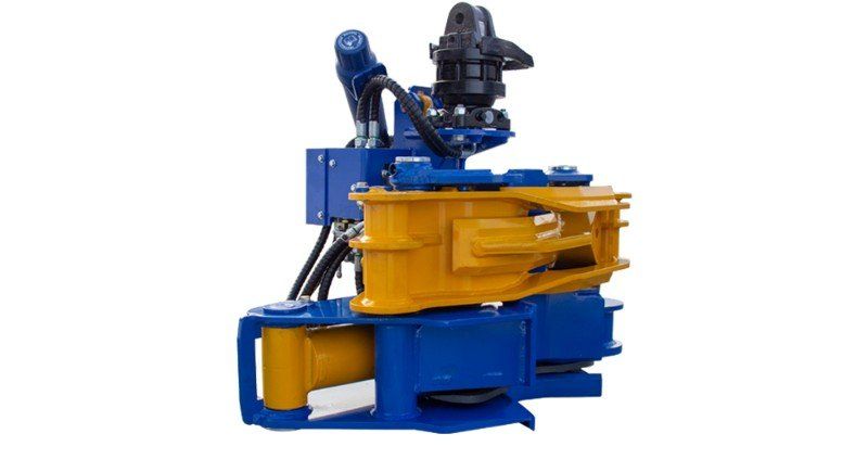 Eine blau-gelbe Maschine steht auf einer weißen Oberfläche.