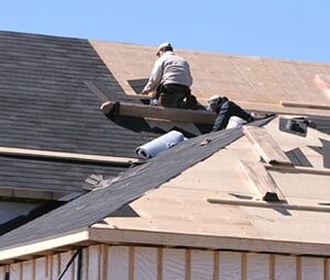 worker installing the roof worker installing the roof