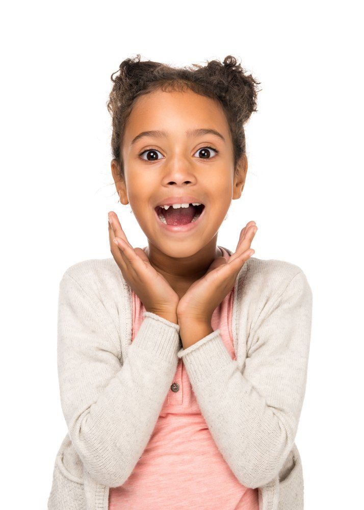 Beautiful Surprised Child — North Platte, NE — States Dental P.C. Beautiful Surprised Child — North Platte, NE — States Dental P.C.