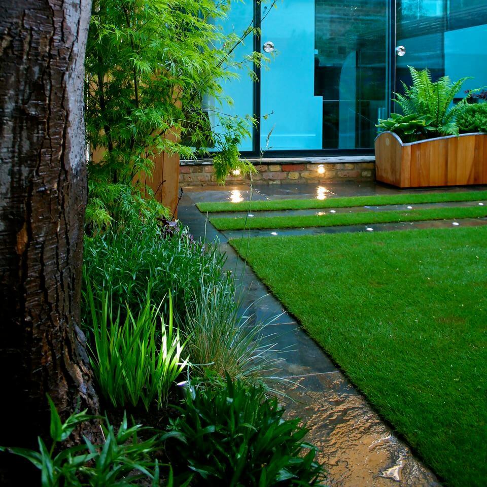 house view from the garden at dusk
