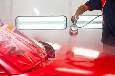 Man Painting Car Body - Auto Paint Work in Souderton, PA