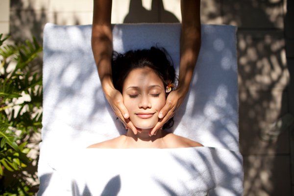 woman getting massage outside