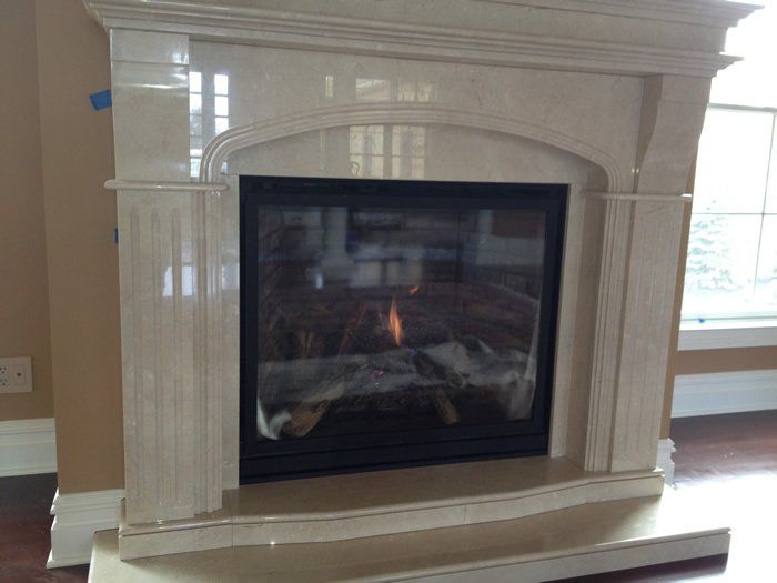 Marble wood burning fireplace