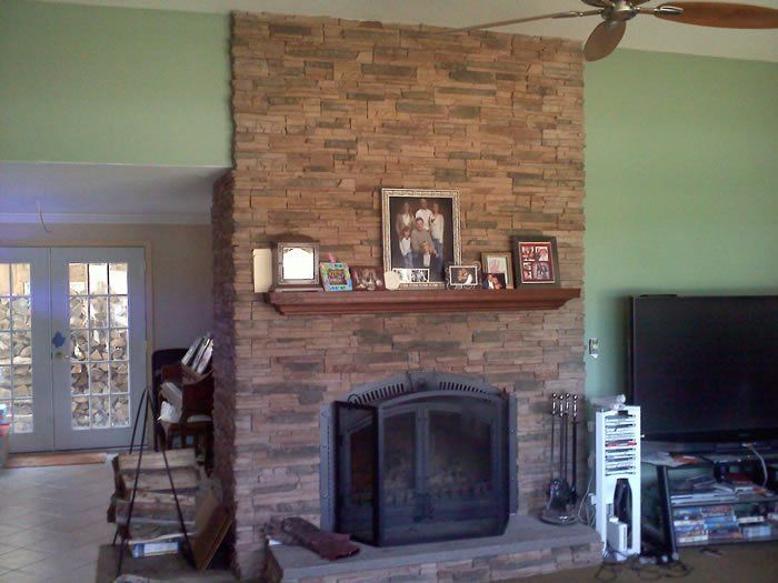 Mantel and stone fireplace