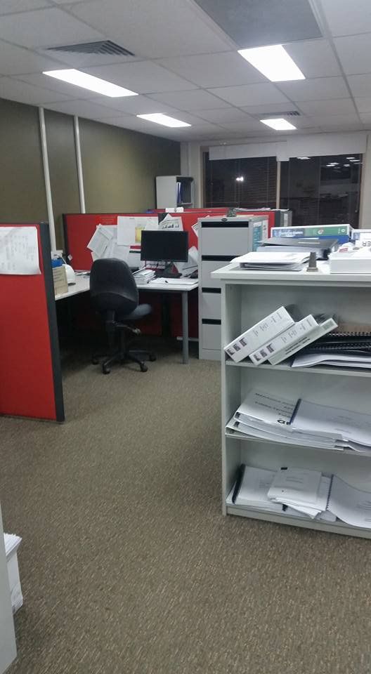idas cleaning office with clean carpet