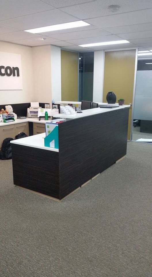 idas cleaning office with clean desks carpet