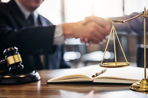 Client And Lawyer Shaking Hands Client And Lawyer Shaking Hands
