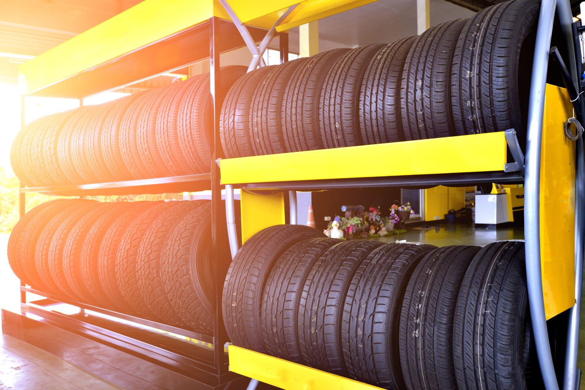 Rows of tires stacked on shelving in a tire shop, fleet tire supply and national accounts in Cincinnati, OH