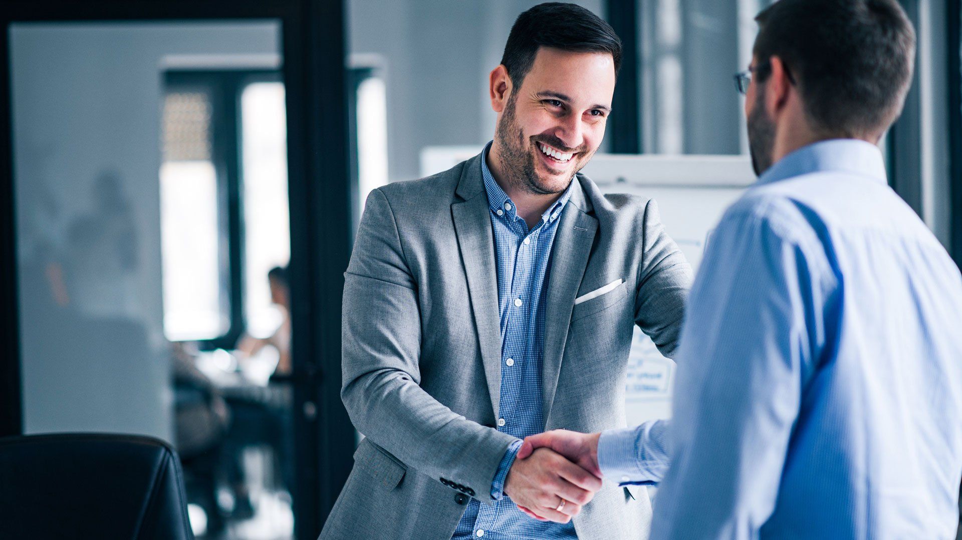 Men Shaking Hands — Stroudsburg, PA — New Horizons Transportation LLC Men Shaking Hands — Stroudsburg, PA — New Horizons Transportation LLC