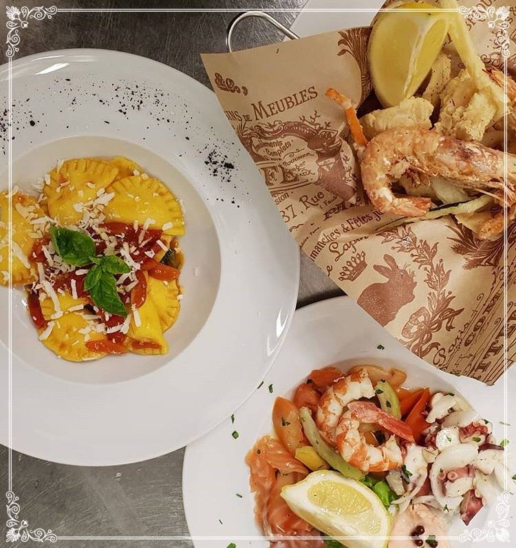 primo piatto di pasta ripiena e frittura di pesce