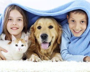 Raccoon Valley Animal Hospital — Children Along with their Pet in Mullica Hill, NJ Raccoon Valley Animal Hospital — Children Along with their Pet in Mullica Hill, NJ