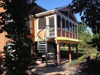 Screened In Porch Contractor Company — Two Wood Seats Outside in Loveland, OH