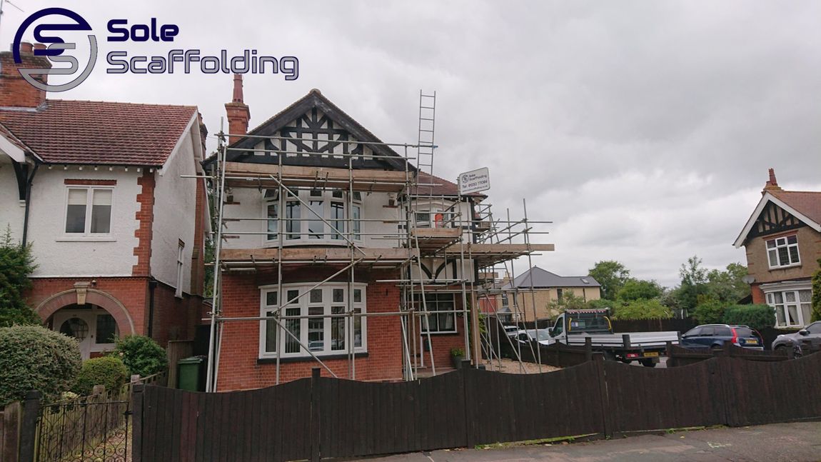 sole scaffolding - scaffold for painting works on a house in March