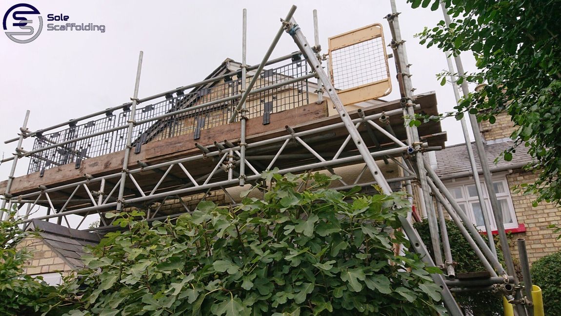 sole scaffolding - bridged scaffold over roof - Ely