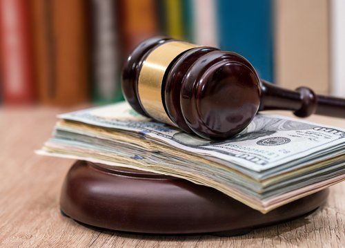 Judge Gavel with Dollars — De Pere, WI — One Law Group S.C Judge Gavel with Dollars — De Pere, WI — One Law Group S.C