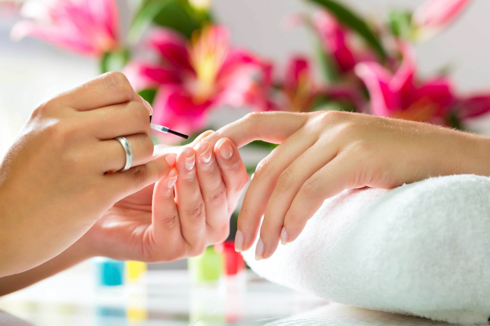 Nail Care — Woman Receiving A Manicure In Yorkville, NY Nail Care — Woman Receiving A Manicure In Yorkville, NY
