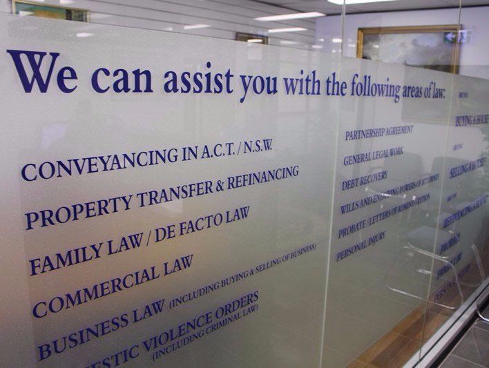 office window signage An office where we provide conveyancing services in Canberra