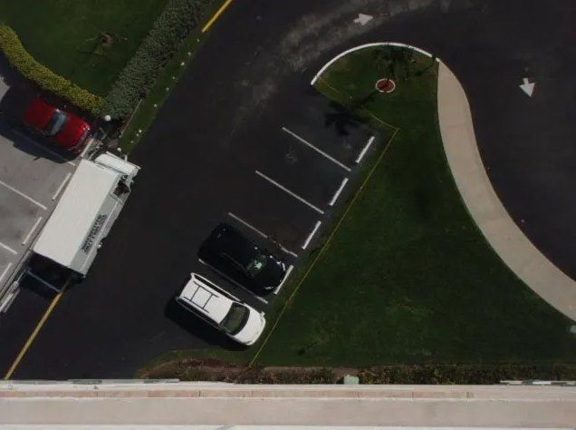 Parking Lot View From Above — Oakland Park, FL — Watertite Gutter Company