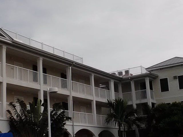 White Commercial Building — Oakland Park, FL — Watertite Gutter Company