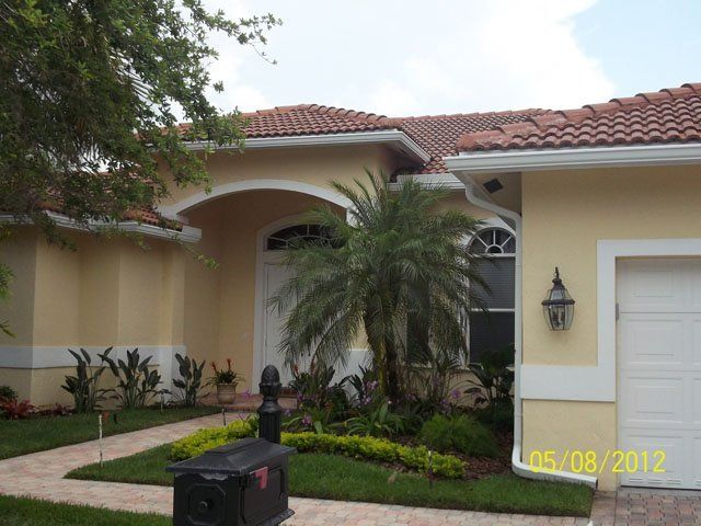 Yellow House — Oakland Park, FL — Watertite Gutter Company